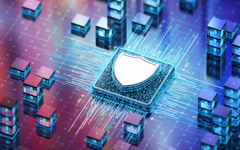 Glowing microchip with a shield icon at its center, symbolizing cybersecurity